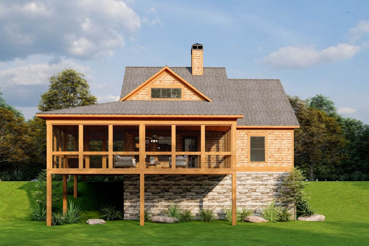 House plan exterior: Two-story home with stone foundation, shingled walls, gabled dormer, and screened porch overlooking a hillside.