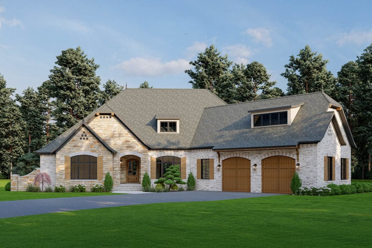House plan exterior featuring a stone and brick facade, gabled roof, dormers, and a two-car garage with arched doors.