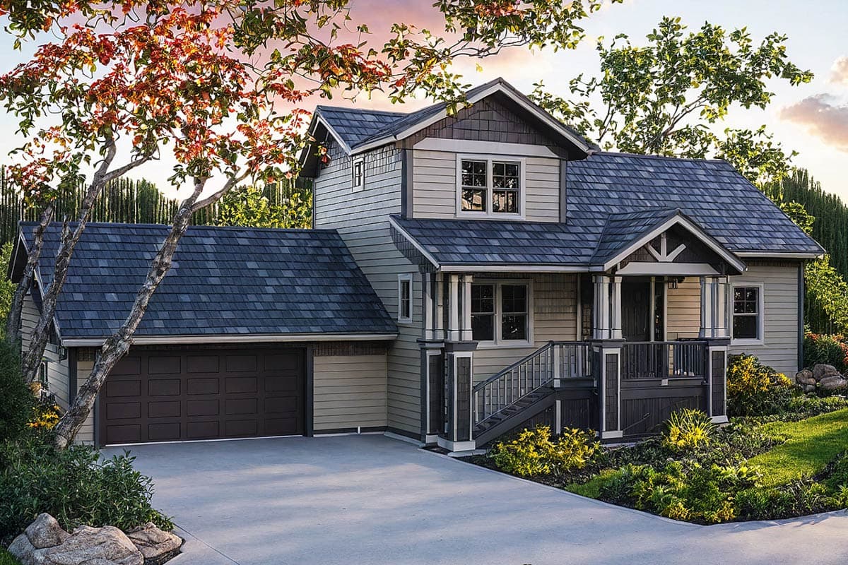 House plan exterior. Two-story Craftsman home with a gabled roof, front porch, and attached garage. Includes dormers and a decorative gable.