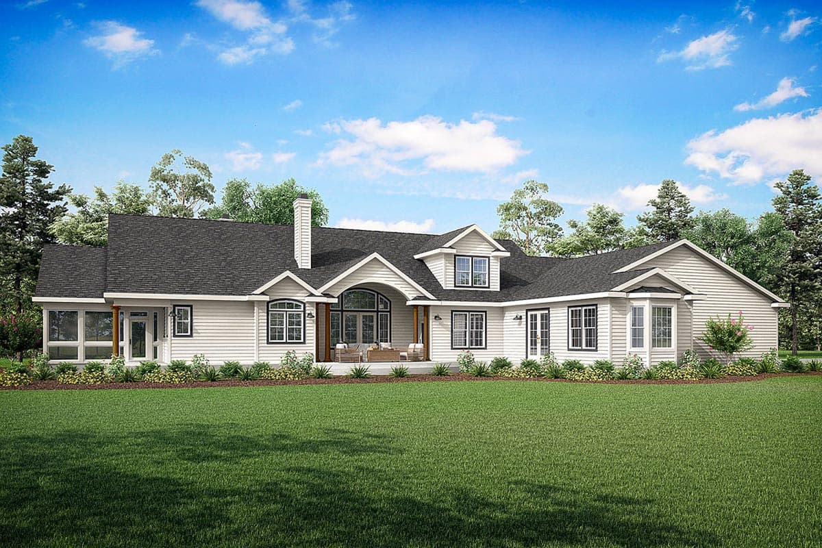 House plan exterior of a one-story Modern Farmhouse with a covered porch, prominent gables, and a bay window.