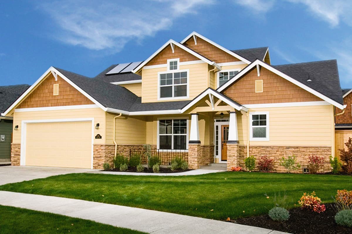 House plan exterior with Craftsman style, two stories, gabled rooflines, and a front-facing garage. Features stone veneer and a covered front porch.