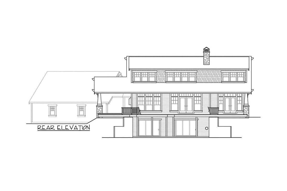 Rear elevation drawing of a multi-story house with multiple windows, doors, a chimney, and a deck.