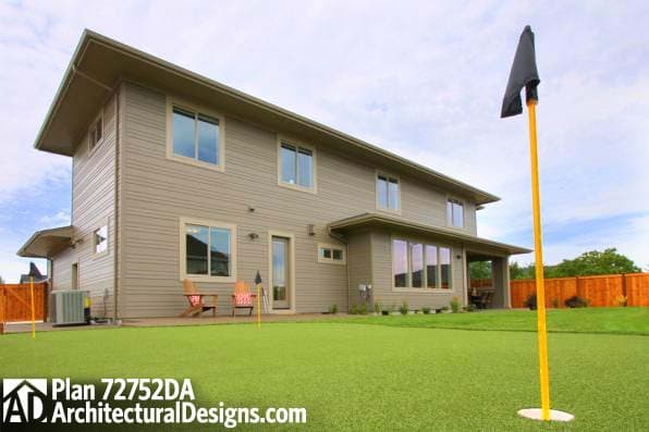 Two-story house plan exterior with horizontal siding, large windows, and a covered patio.