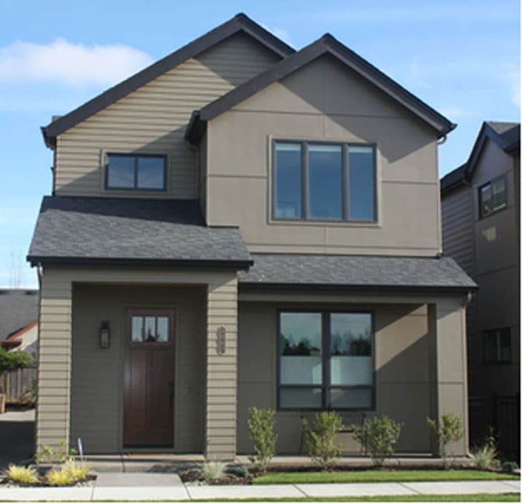 Modern two-story house plan exterior with covered entry porch, contrasting siding, and multiple gables.