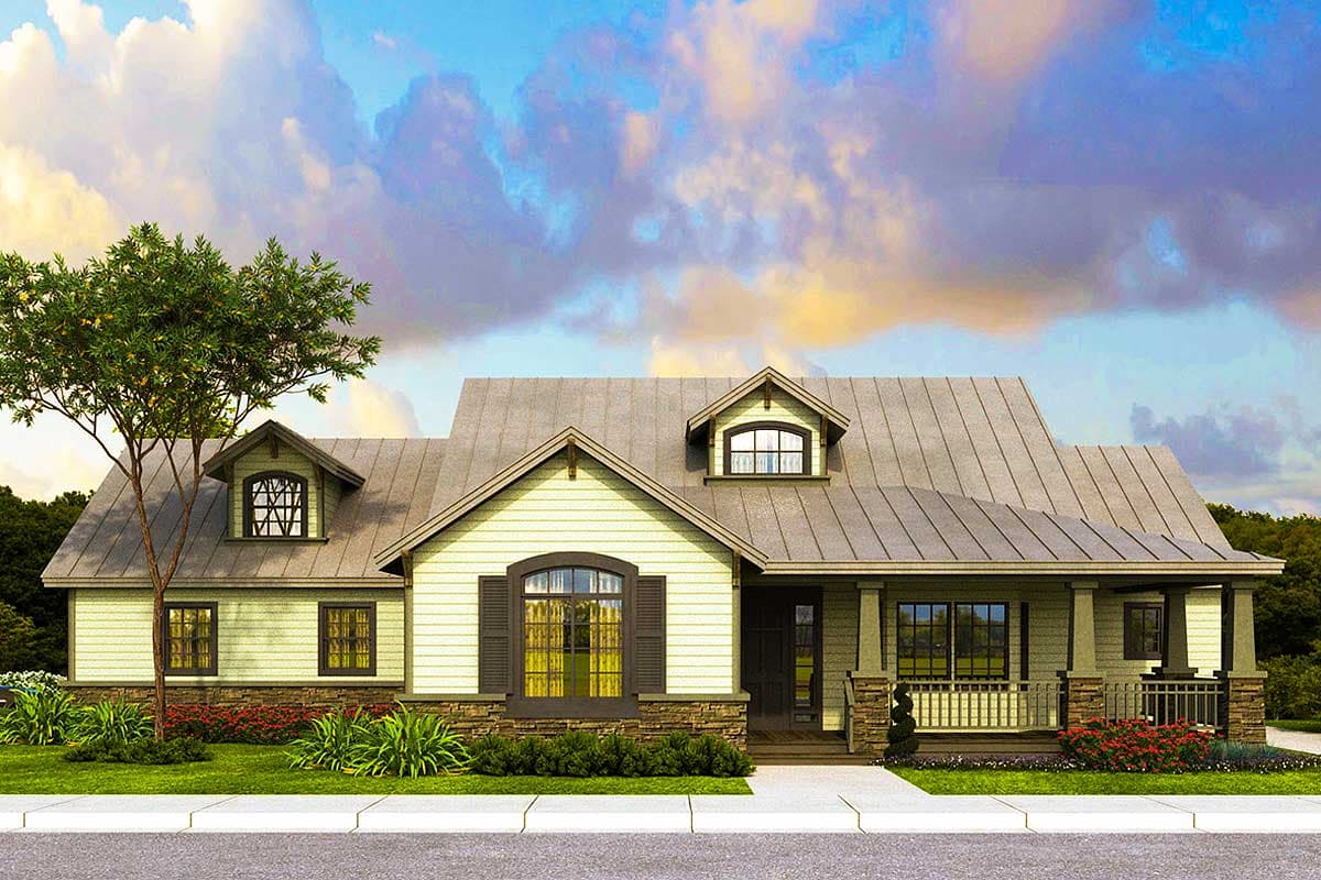House plan exterior: one-story ranch with metal roof, dormers, stone accents, and covered front porch.