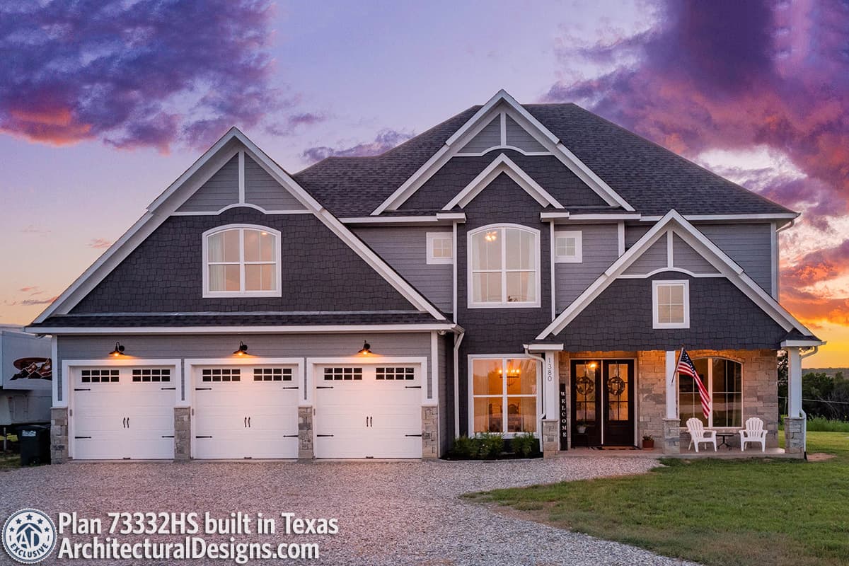 House plan exterior: two-story Modern Farmhouse with three-car garage, gables, dormers, and stone accents.