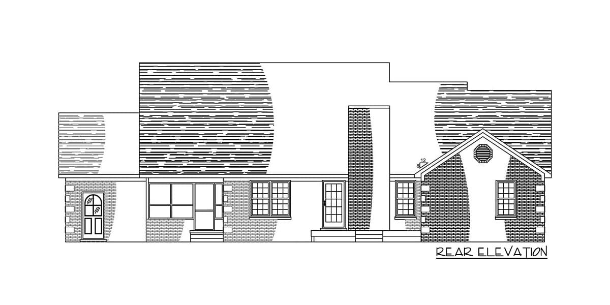 Rear elevation drawing of a house plan showing a brick facade, multiple gables, a prominent chimney, and various window styles.