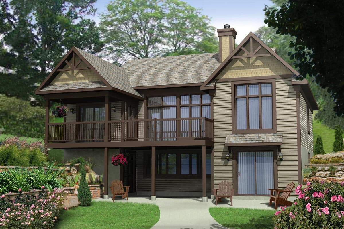 House plan exterior with a wraparound deck, gable accents, and large windows. This multi-story design features siding and shake accents.