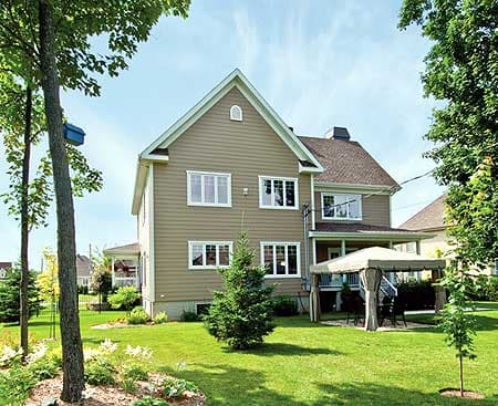 House plan exterior, two-story home with gabled roof, dormer, and covered patio with canopy.