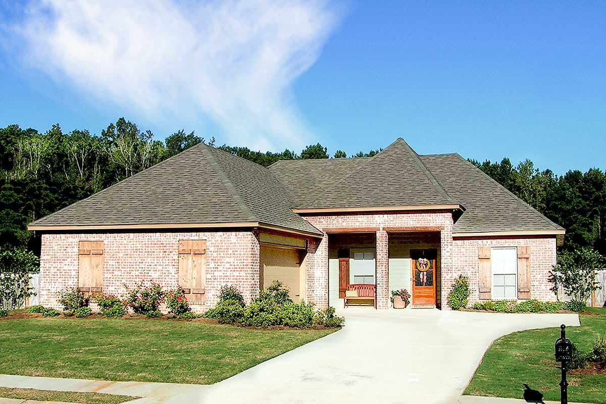 House plan exterior: one-story brick home with a covered front porch, garage, and wood shutters.