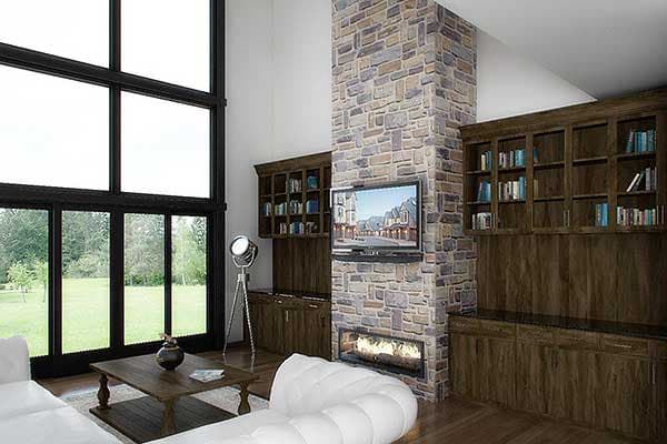 Living room with floor-to-ceiling windows, stone fireplace, mounted TV, and built-in wood cabinetry.