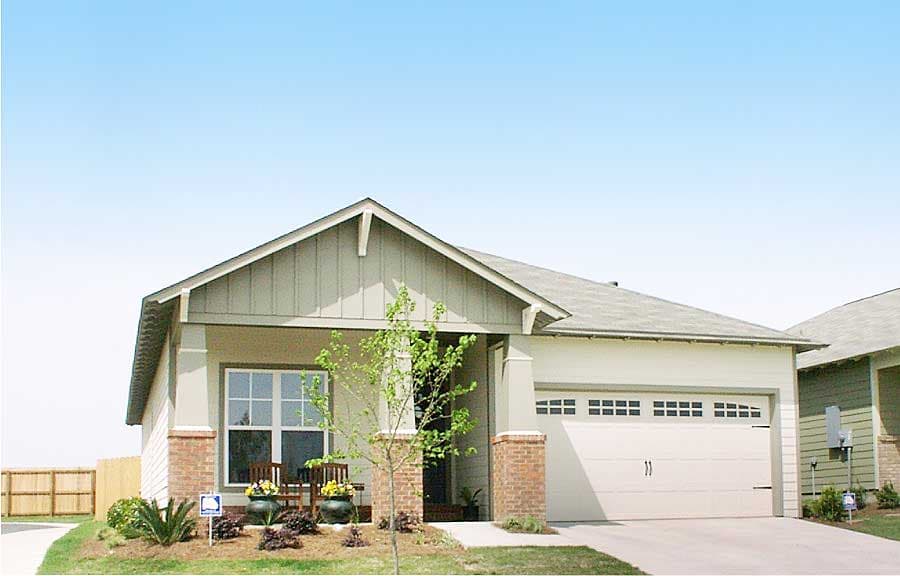 One-story house plan exterior with gabled front porch, brick accents, and a two-car garage.