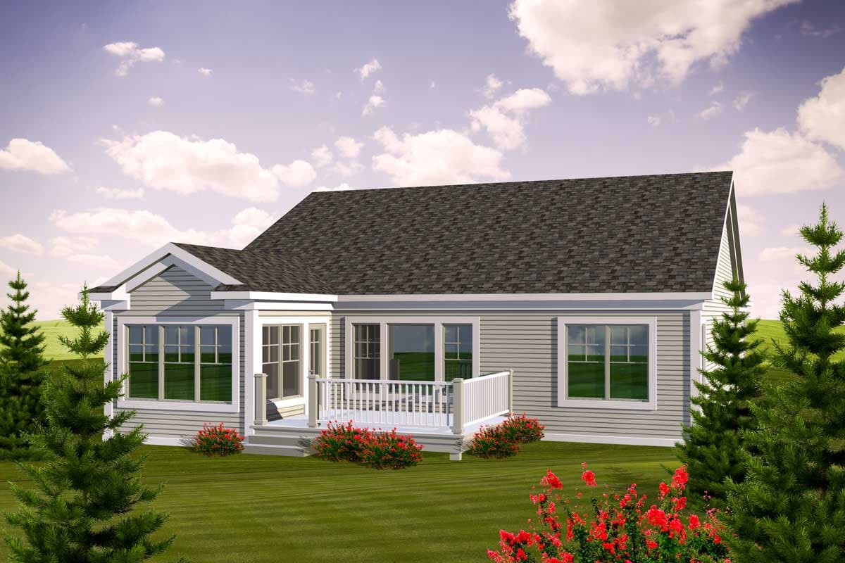 House plan exterior: One-story home with a prominent gable, large windows, and a raised deck with white railings.