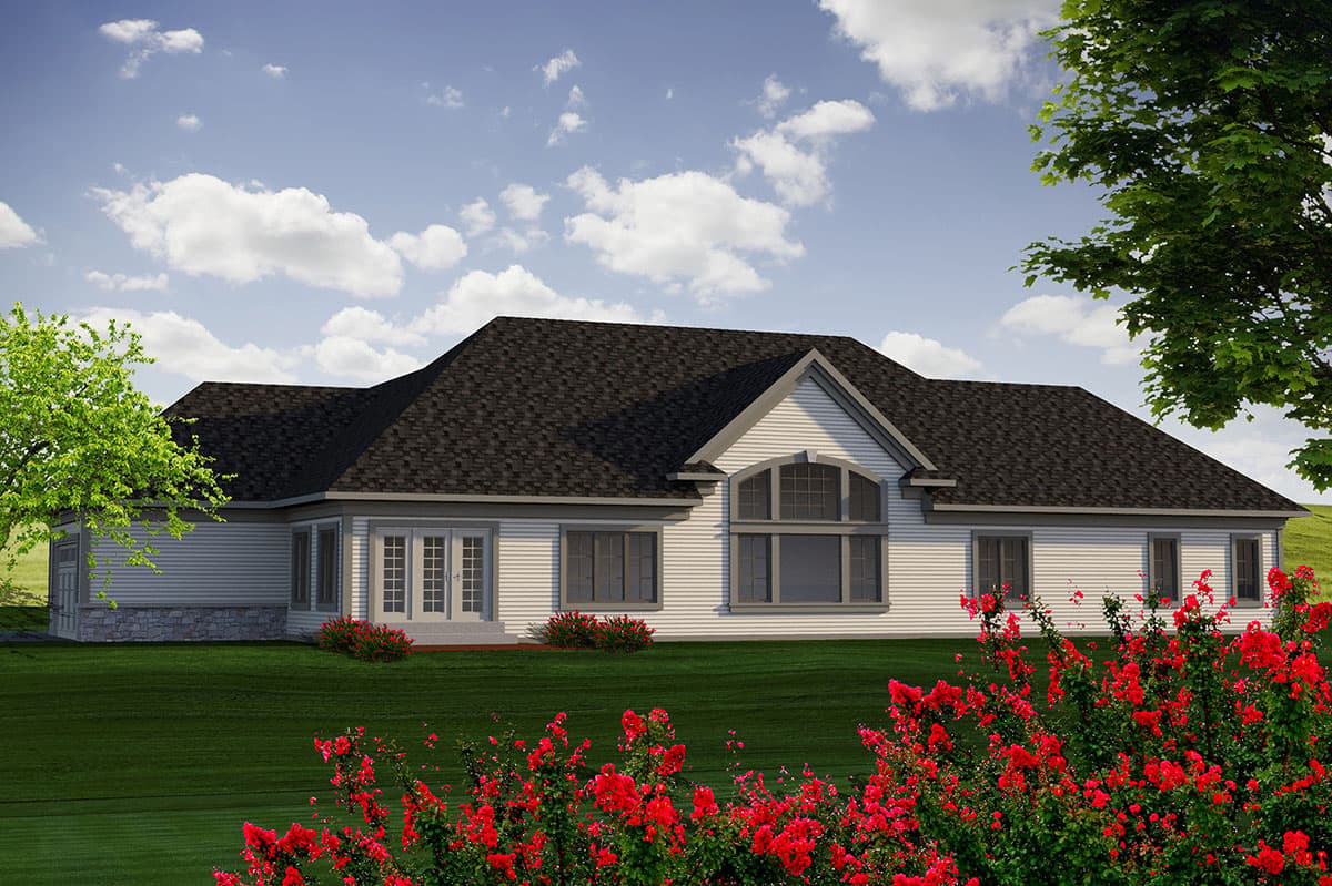 House plan exterior: single-story home with gabled roof, arched windows, stone foundation, and double front doors.