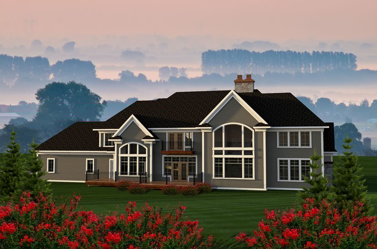 House plan exterior: two-story home with gables, stone chimney, deck, and large arched windows.