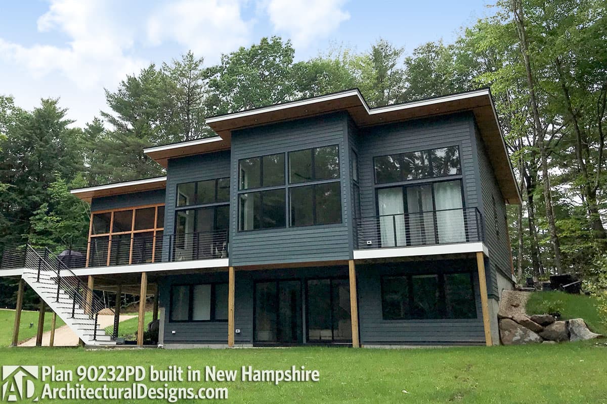 Modern house plan exterior with multiple gables, large windows, balconies, and a screened porch.