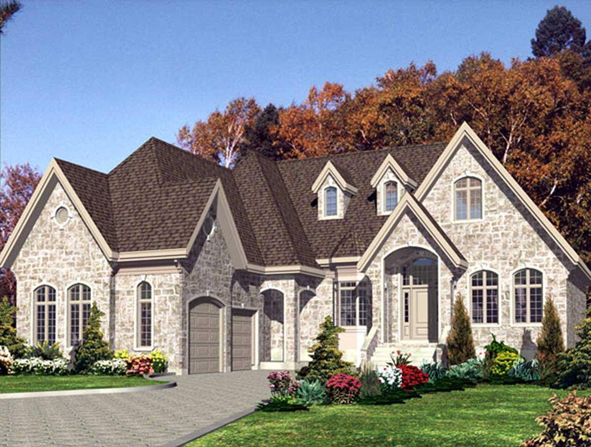 House plan exterior: stone facade, multiple gables, arched entry, and a three-car garage.