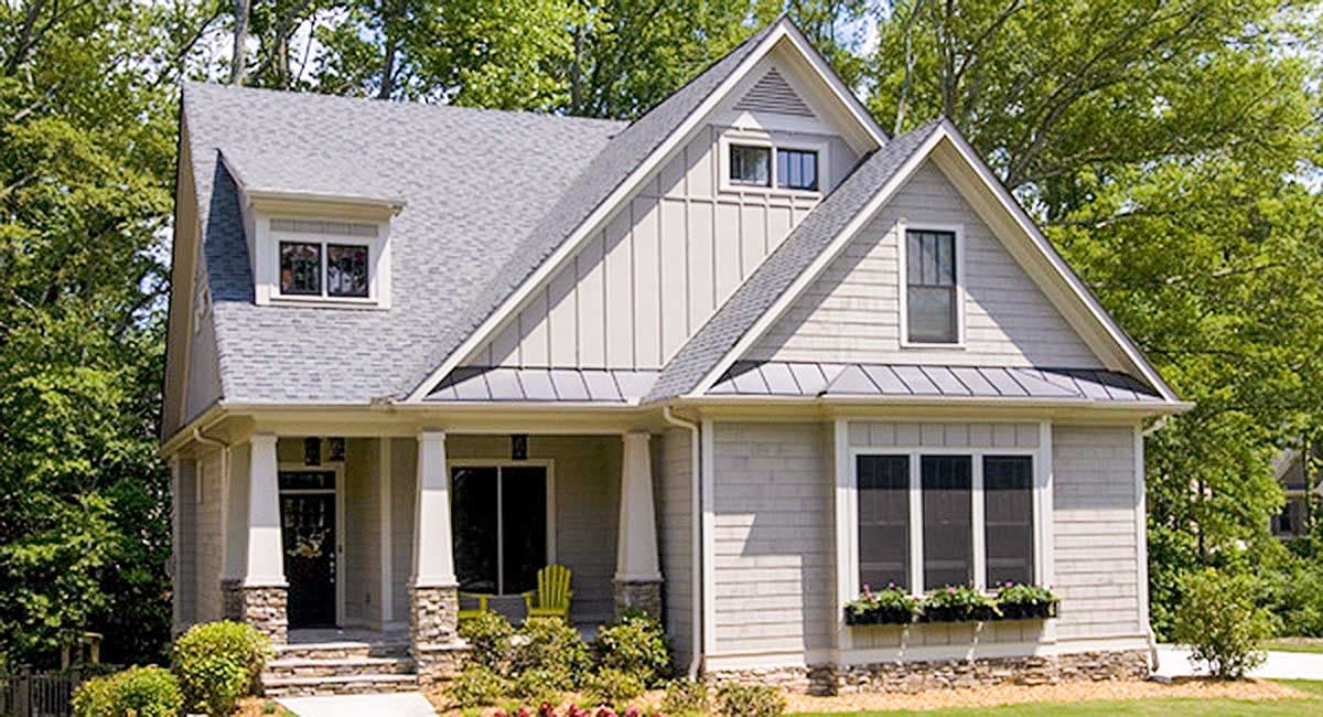 House plan exterior featuring a covered front porch, dormer window, gables, and vertical siding.