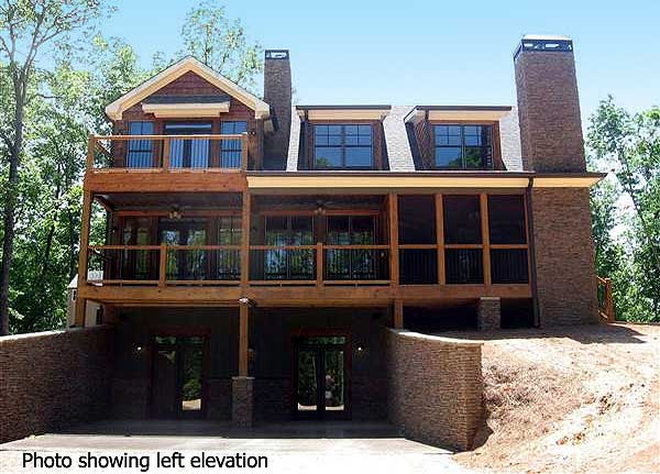 House plan exterior, three stories, large screened porch, upper balcony, stone chimney, and sloped lot.