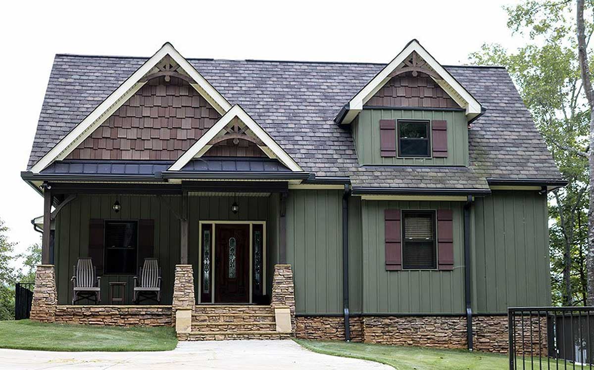 Craftsman style house plan exterior with a covered front porch, stone accents, and multiple gables.