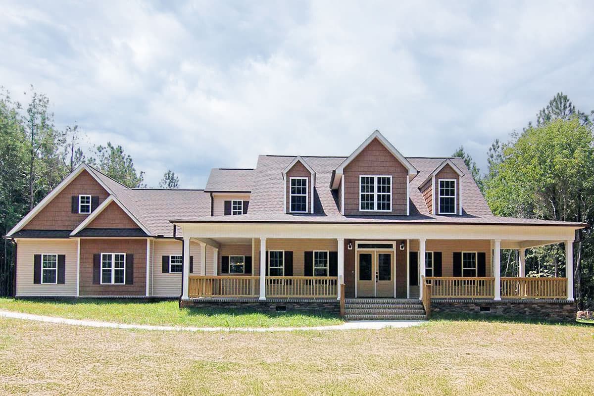 House plan exterior: Two-story Modern Farmhouse with wraparound porch, dormers, and gable accents.