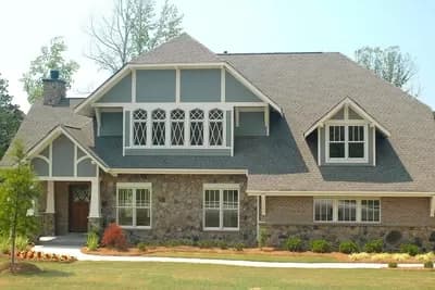 European Tudor Style with 3 Car Garage 