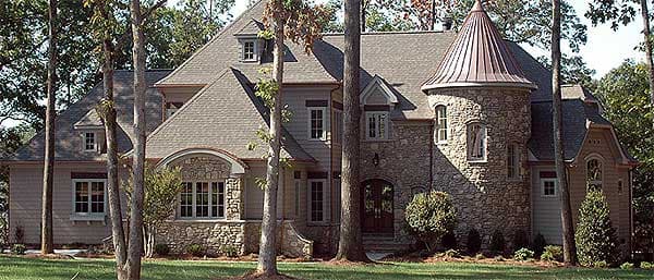 House plan exterior with stone accents, prominent turret with copper roof, multiple gables, and dormer windows.