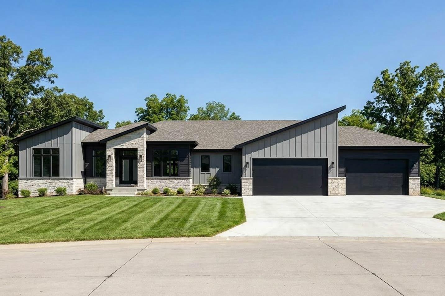 Plan 42744DB: Modern House Plan with Split Bedrooms and Expansive 4-Car Garage - Image #1 - Contemporary, Modern