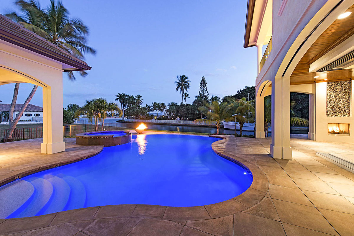 Exclusive Contemporary Vacation Home Plan with a Golf Cart Area in ...